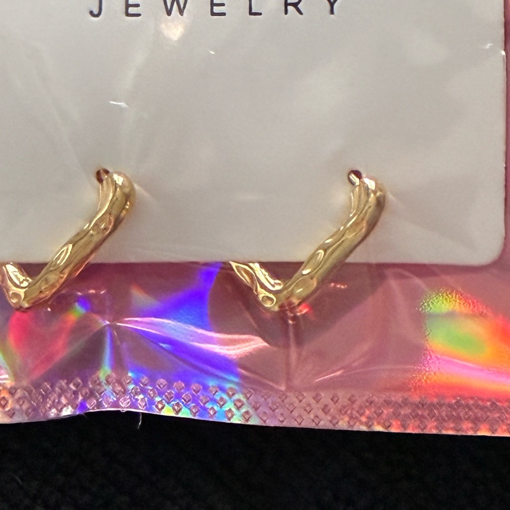NWT Gold plated stainless steel huggie earrings